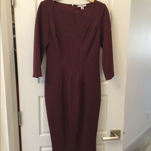 Zac burgundy knee length business or cocktail dress with 3/4 sleeves